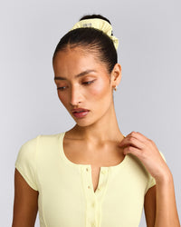 SoftMotion™ Scrunchie with Grey Logo | Pastel Yellow