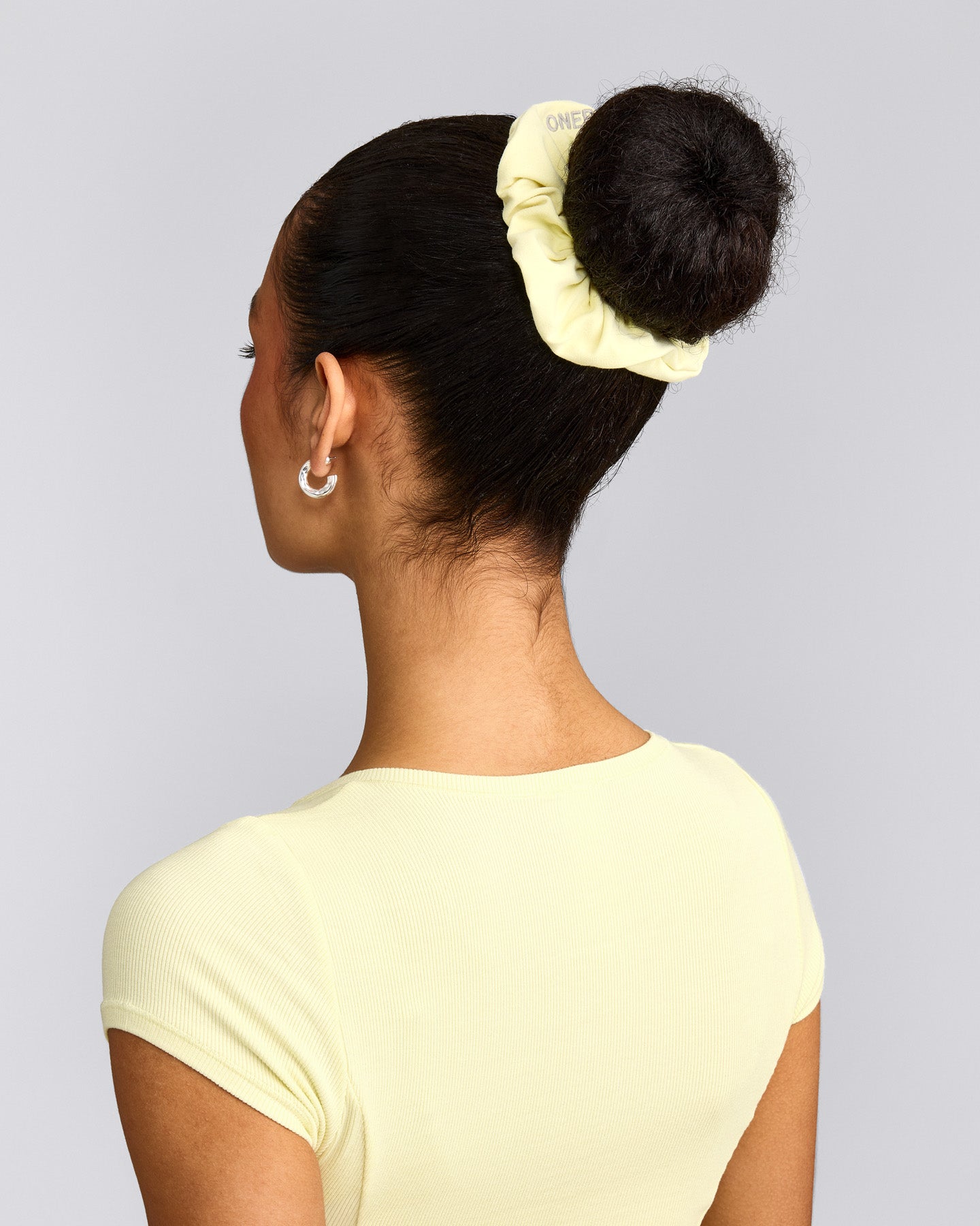 SoftMotion™ Scrunchie with Grey Logo | Pastel Yellow