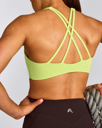 EasyLift™ High Neck Sports Bra with Gray Logo | Citrus Green