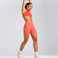 EasyLift™ High Neck Sports Bra with Grey Logo | Hyper Orange