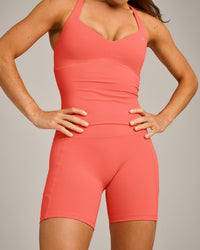 UnifiedMove™ T Back Mid Vest with Built in Bra Shelf with Reflective Logo | Light Charged Coral
