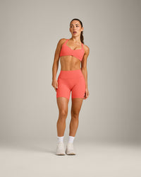 UnifiedMove™ T Back Minimal Bralette with Reflective Logo | Light Charged Coral