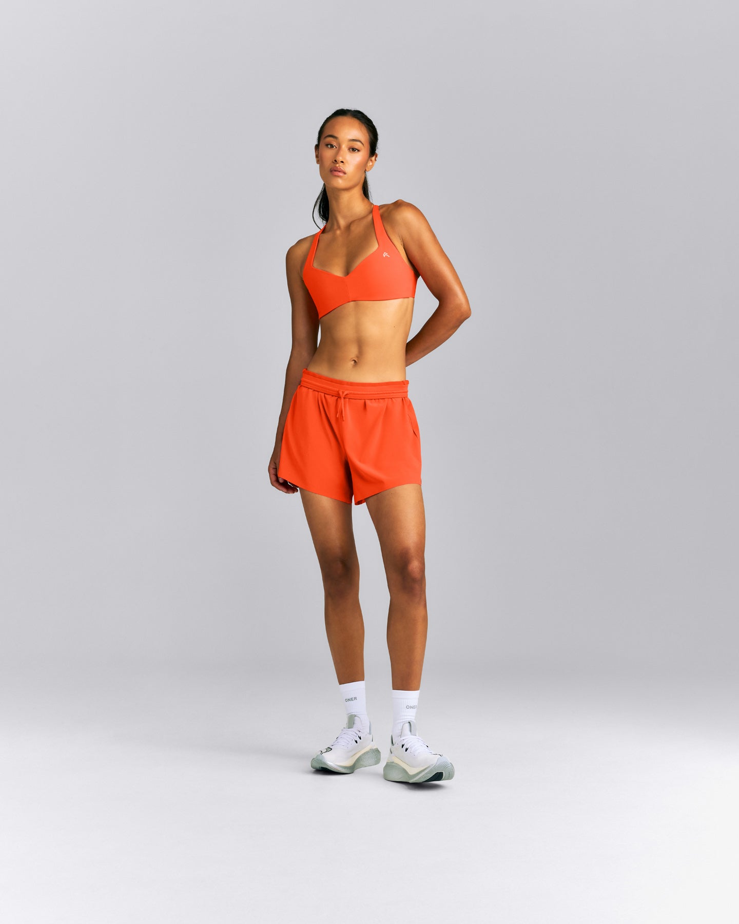 AirMove™ Lined Pocket Shorts 4" | Energy Orange