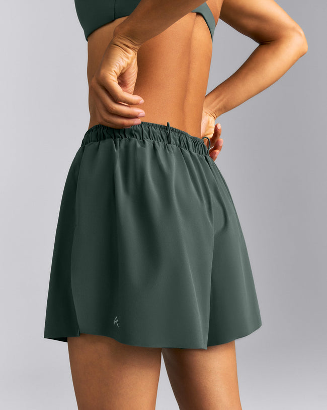 AirMove™ Lined Pocket Shorts 4" | Shadow Green