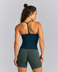 UnifiedMove™ T Back Mid Tank Top with Gel Pockets and Built in Bra Shelf | Oil Blue
