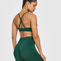 EnhanceLift™ Seamless Strappy Sports Bra with White Logo | Racing Green