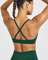 EnhanceLift™ Seamless Strappy Sports Bra with White Logo | Racing Green