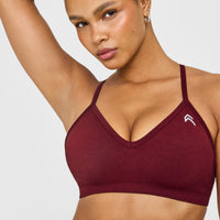 EnhanceLift™ Seamless Strappy Sports Bra with White Logo | Rosewood