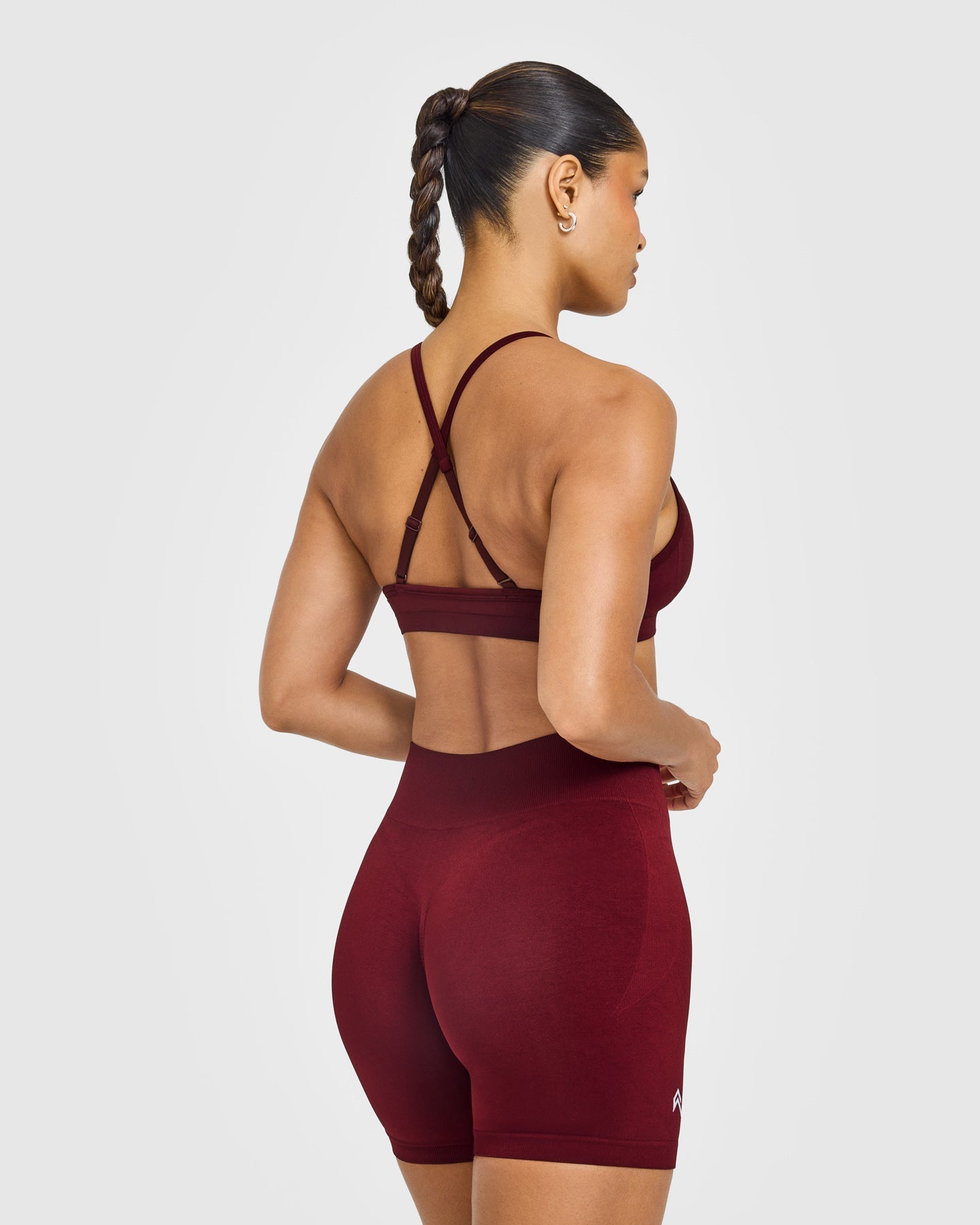 EnhanceLift™ Seamless Strappy Sports Bra with White Logo | Rosewood
