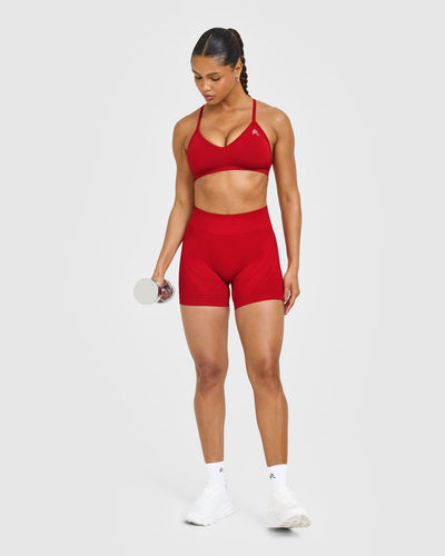 EnhanceLift™ Seamless Strappy Sports Bra with White Logo | Light Toasted Red