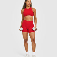 SoftMotion™ High Neck Sports Bra with White Logo | Light Toasted Red