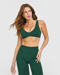 SoftMotion™ Scoop Back Bralette with White Logo | Dark Racing Green