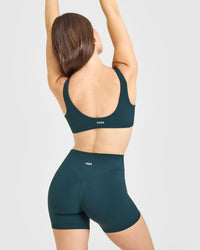 SoftMotion™ Scoop Back Bralette with White Logo | Oil Blue