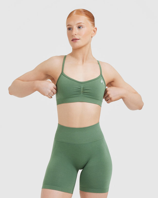 https://ca.oneractive.com/cdn/shop/products/EFFORTLESS_STRAPPY_BRALETTE_FOREST_GREEN_01_650x.jpg?v=1701957382